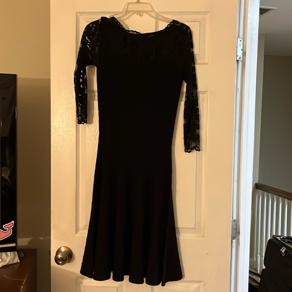 Black long sleeve dress with lace detail. Size XS